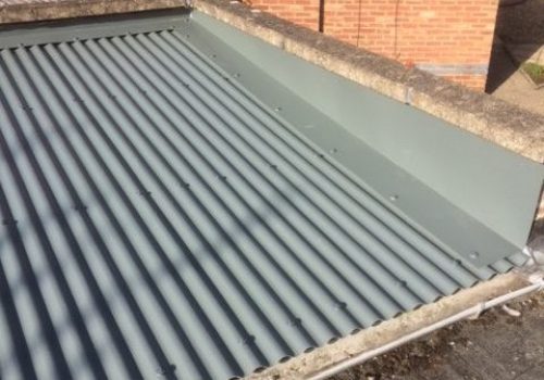 Custom steel flashings including ridge caps and bargeboards